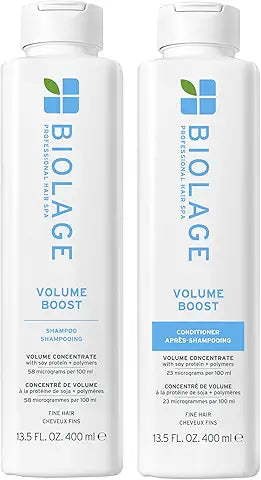 Two bottles of Biolage Volume Boost shampoo and conditioner on a white background