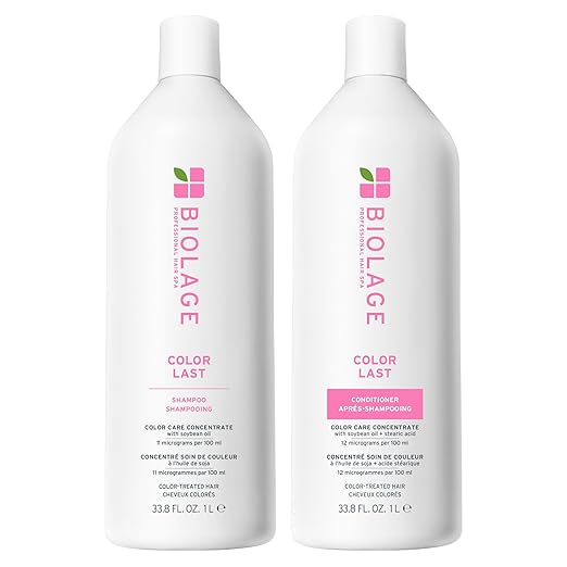 Two bottles of Biolage Color Last shampoo and conditioner on a white background