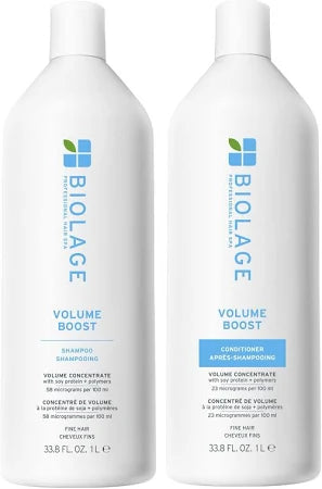Two bottles of Biolage Volume Boost shampoo and conditioner on a white background