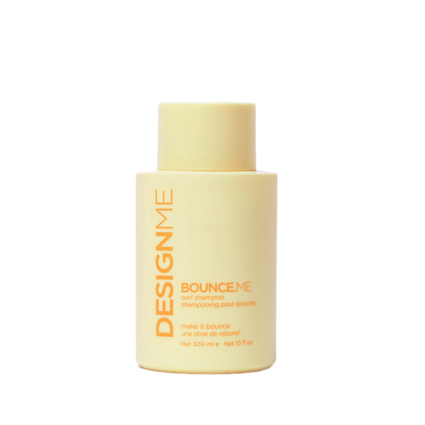 Yellow bottle of DesignMe hair product on a white background