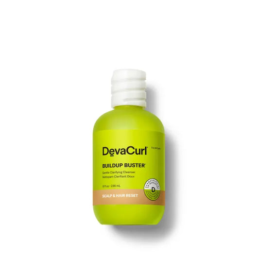 Devacurl Buildup Buster bottle on a white background