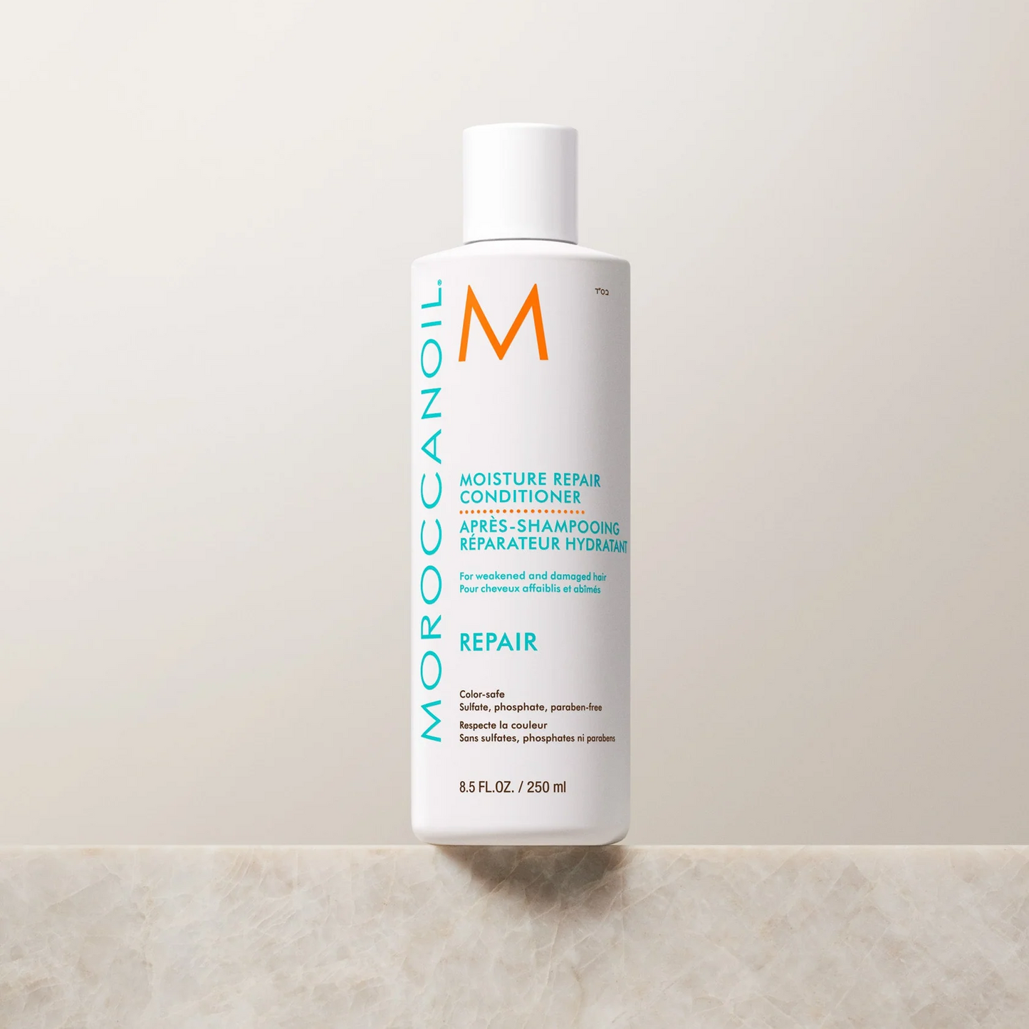 Moroccanoil conditioner bottle on a light background