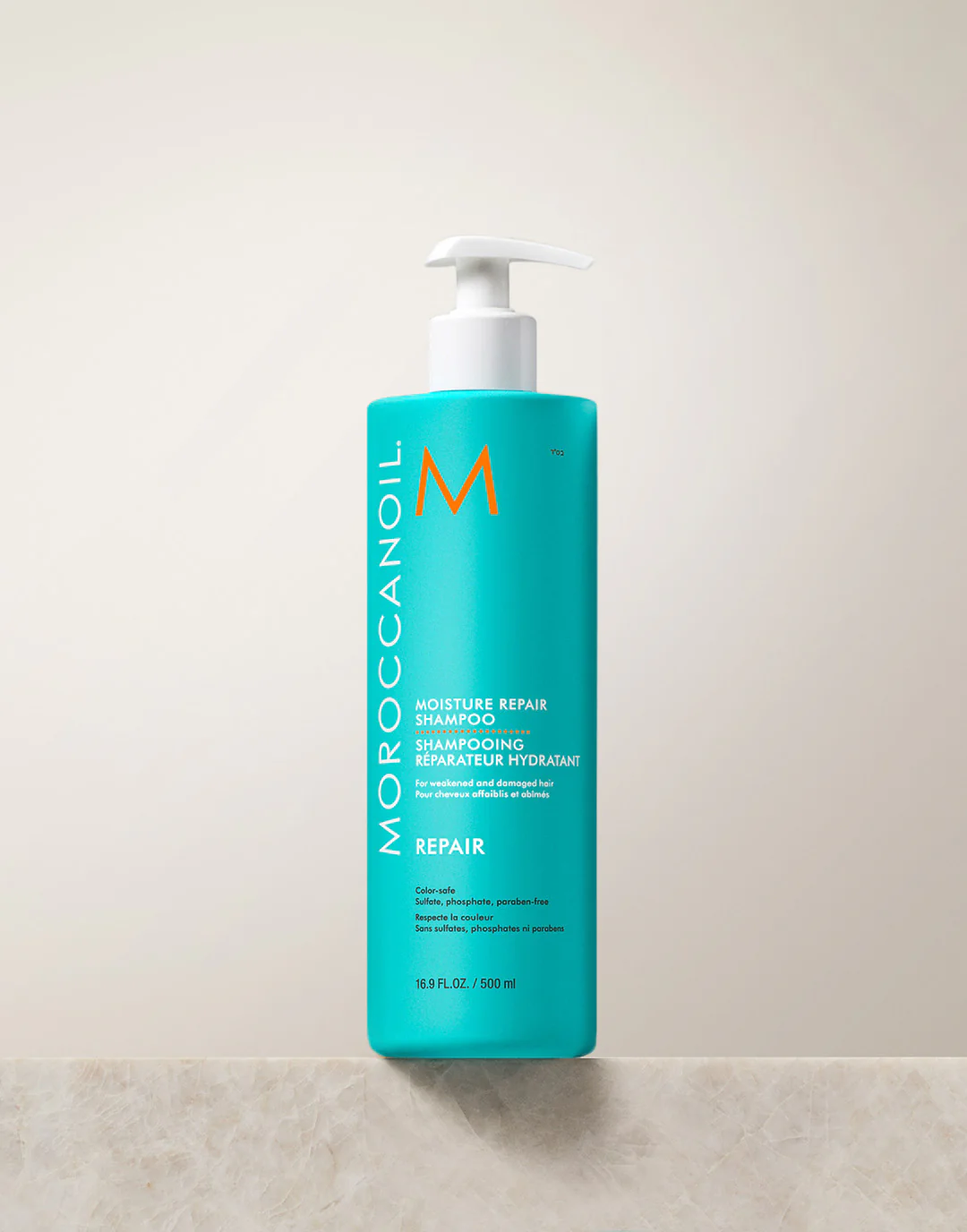 Moroccanoil shampoo bottle on a light background