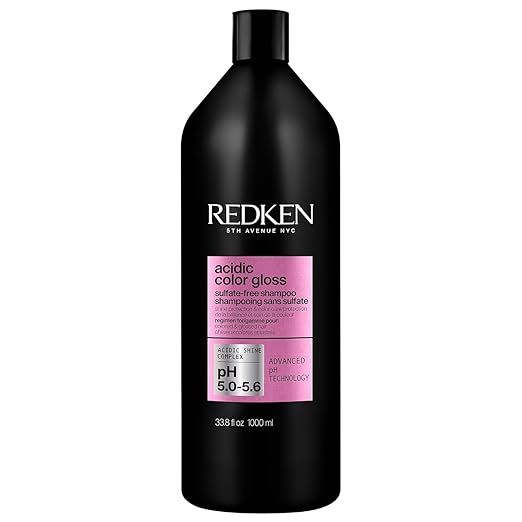 Redken acidic color gloss shampoo bottle on a white background