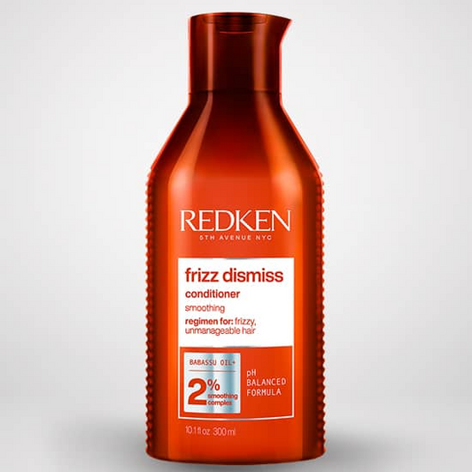 Redken frizz dismiss conditioner bottle on a white background