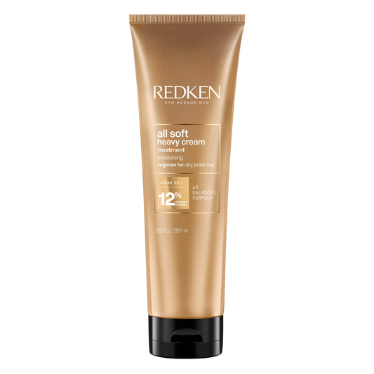 Redken all soft heavy cream treatment tube on a white background
