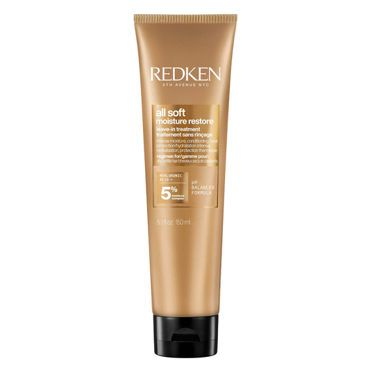 Redken hair treatment tube on a white background