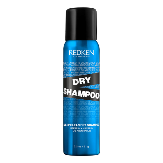 Redken dry shampoo can on a white background