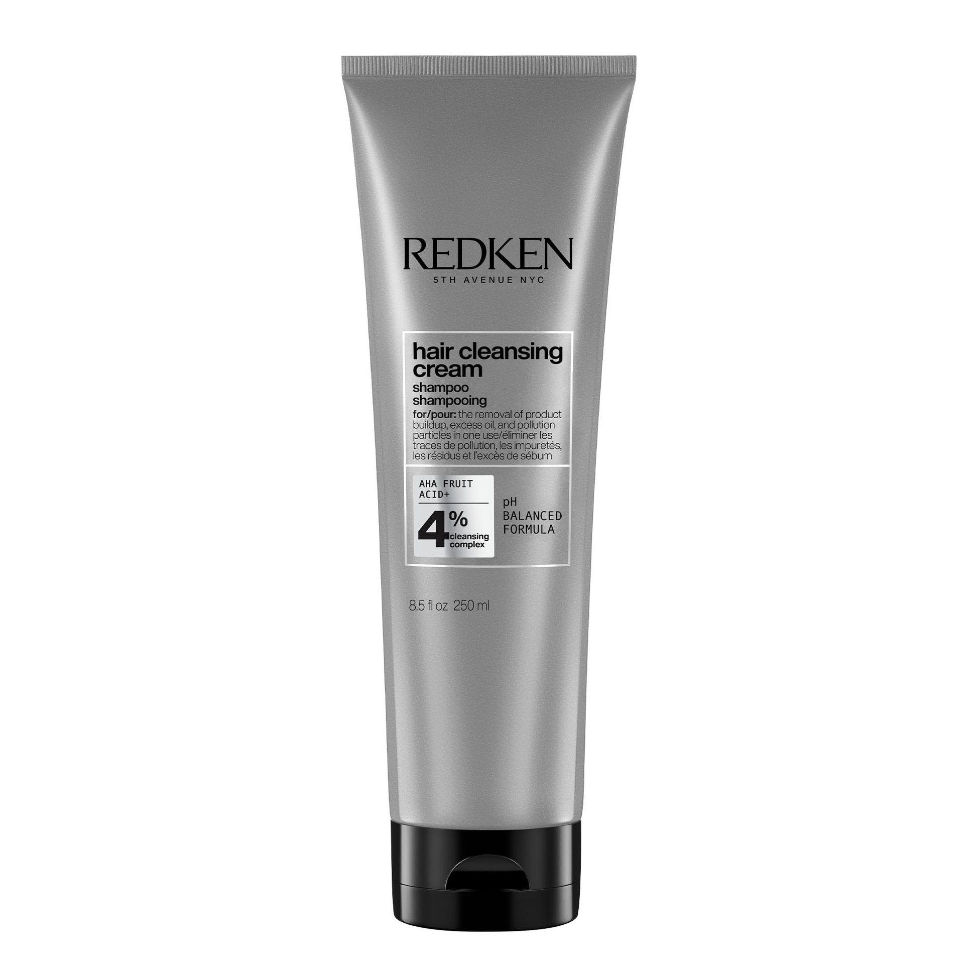 Redken hair cleansing cream tube on a white background