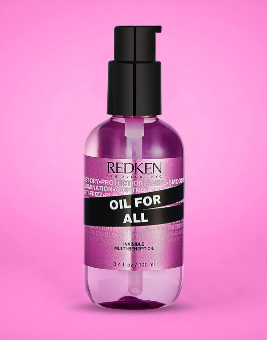 Redken Oil For All bottle on a pink background