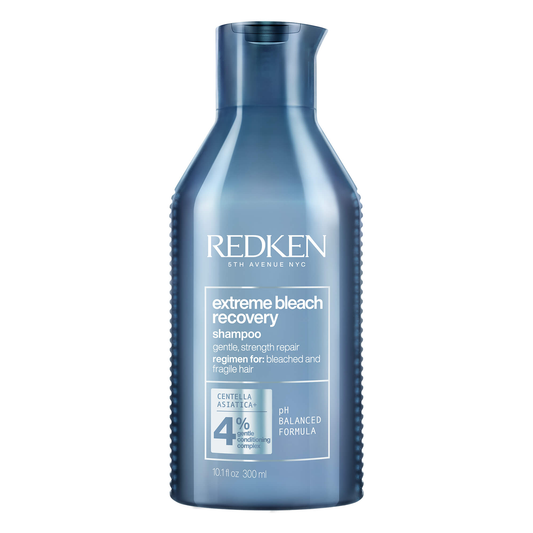 Redken Extreme Bleach Recovery shampoo bottle on a white background