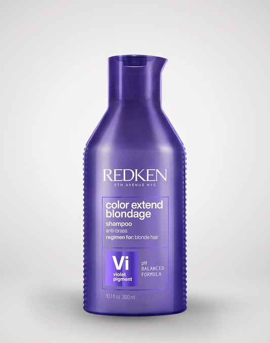 Redken color extend blondage shampoo bottle on a white background