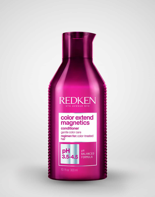 Redken color extend magnetics conditioner bottle on a white background
