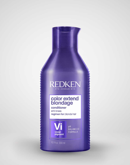 Redken Color Extend Blondage conditioner bottle on a white background
