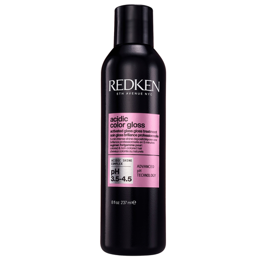 Redken Addic Color Gloss bottle on a white background