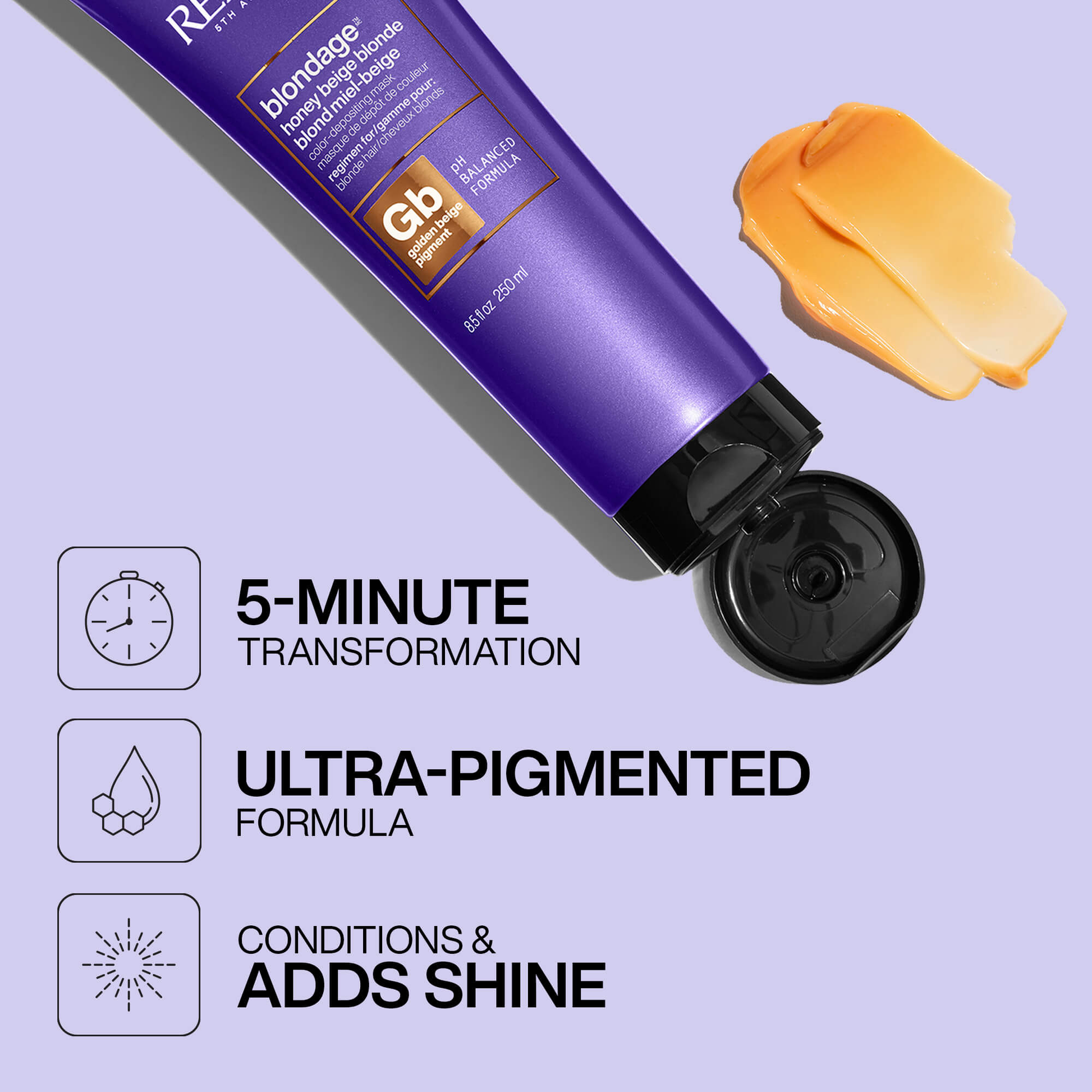 Purple hair product tube with orange sample on a light purple background