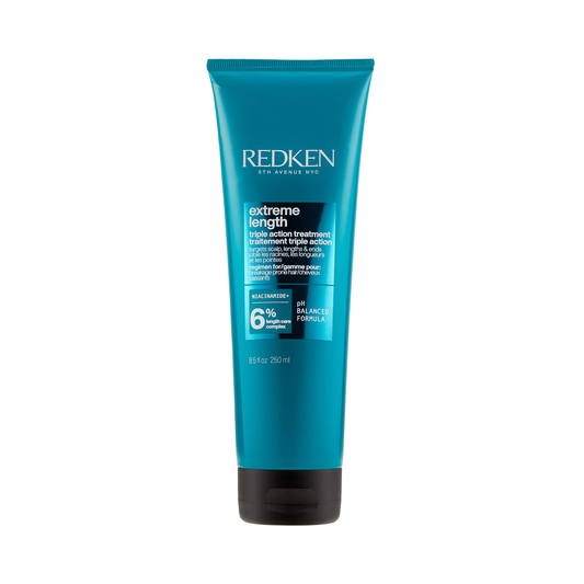 Blue tube of Redken Extreme Length hair treatment on a white background