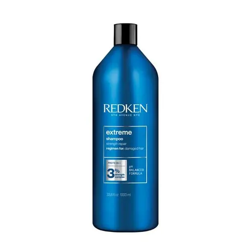 Redken extreme shampoo bottle on a white background