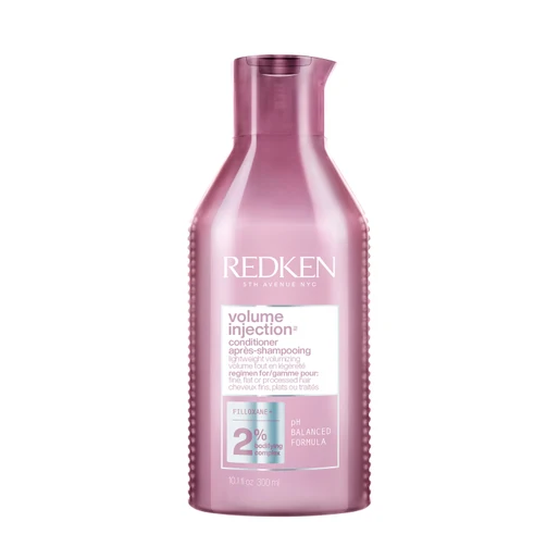 Redken volume injection shampoo bottle on a white background