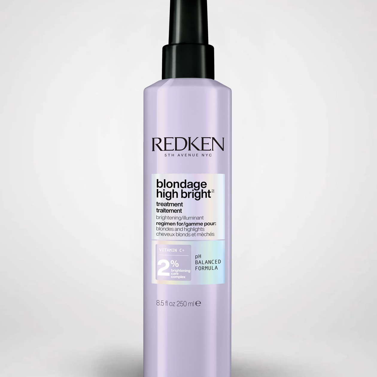 Redken Blondage High Bright hair treatment bottle on a light gray background