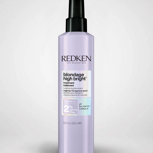 Redken Blondage High Bright hair treatment bottle on a light gray background