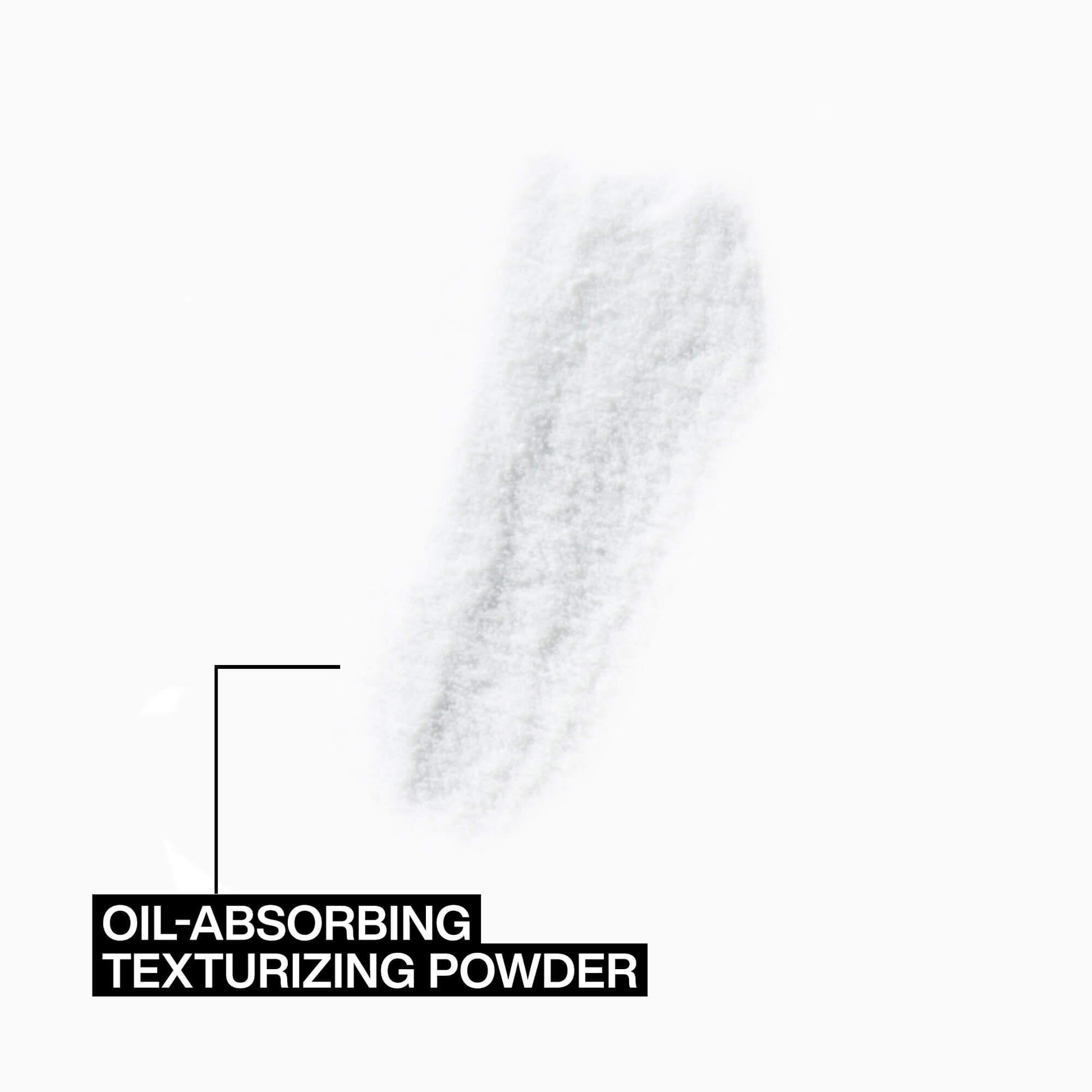 Oil-absorbing texturizing powder with a white powder trail on a white background.
