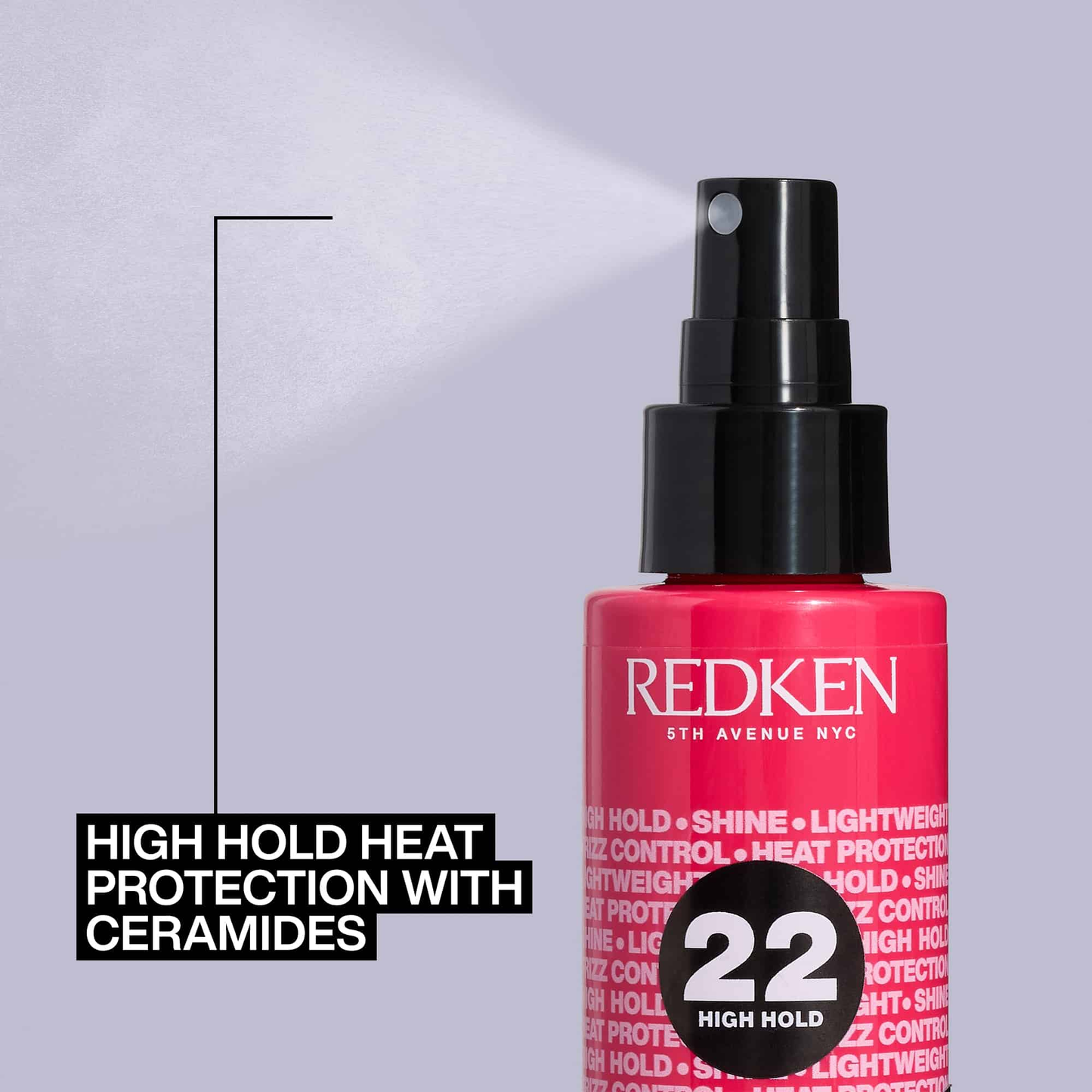 Redken hair product bottle with text on a gray background