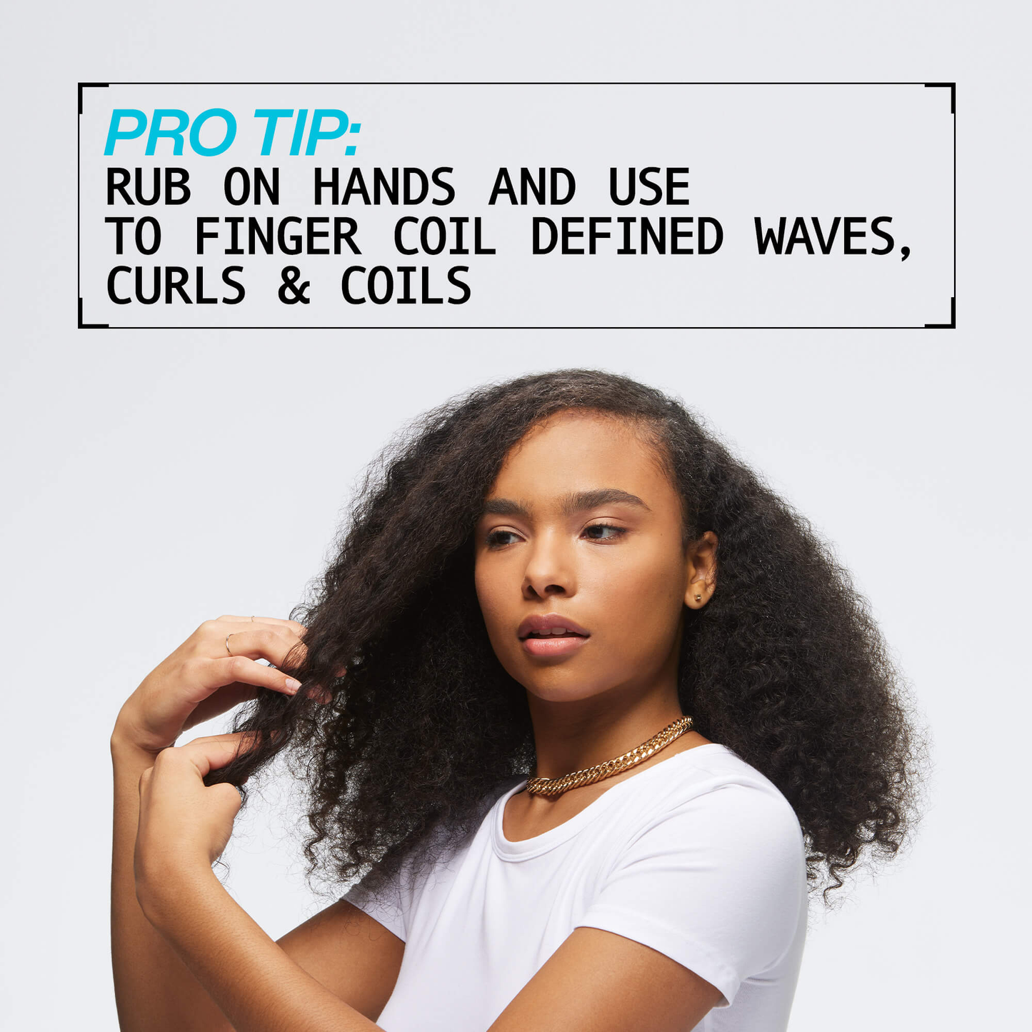 Woman with styled hair against a light background with text overlay.