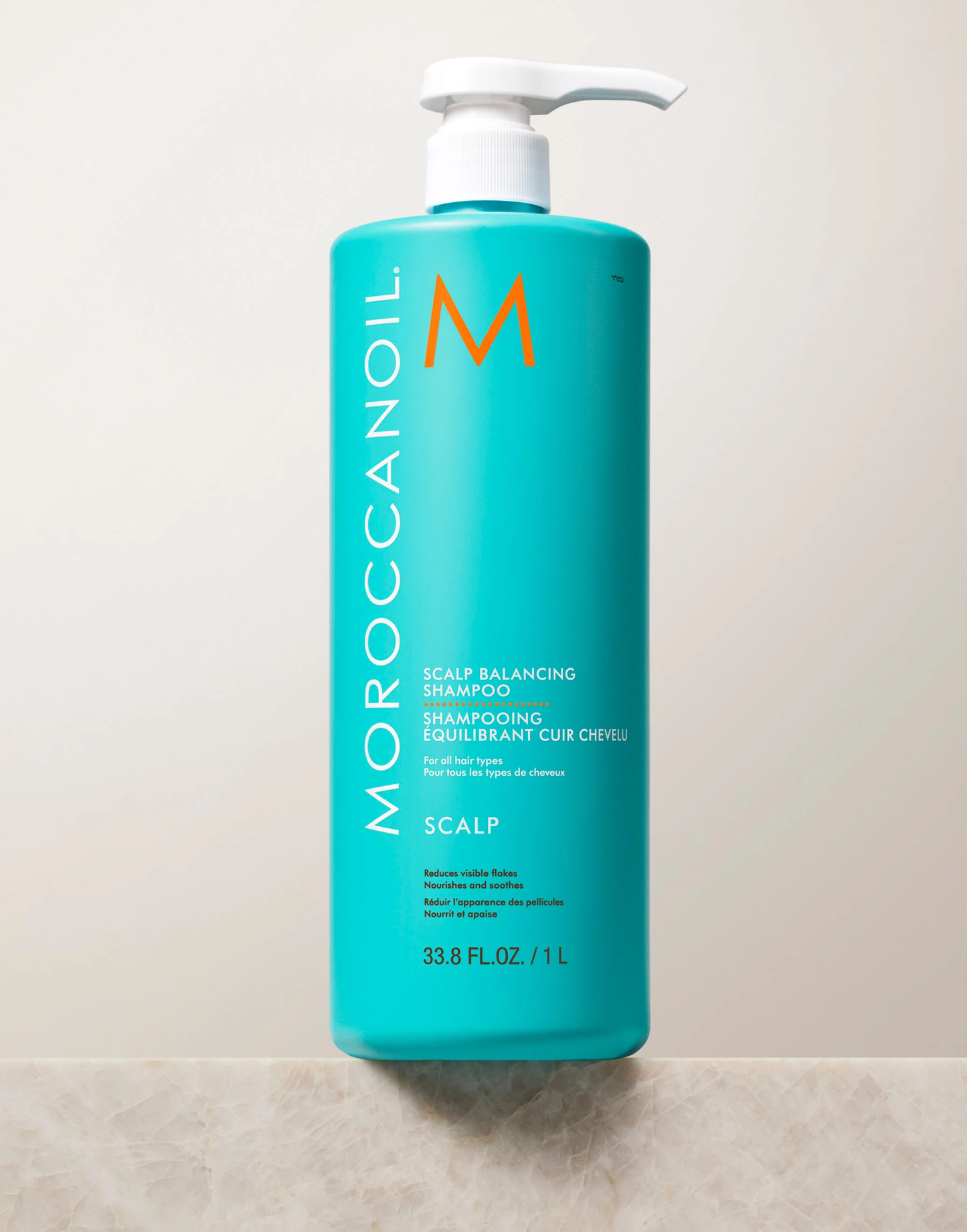 Moroccanoil shampoo bottle on a light background