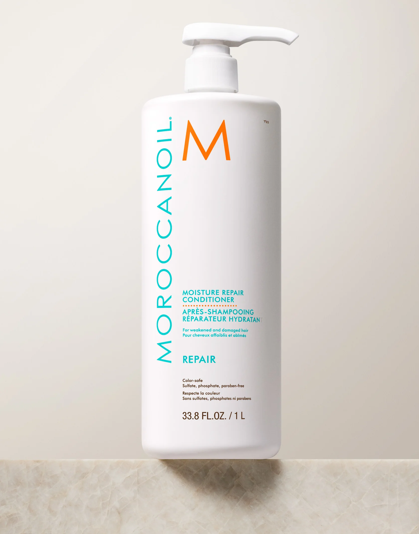 Moroccanoil Moisture Repair Conditioner bottle on a light background