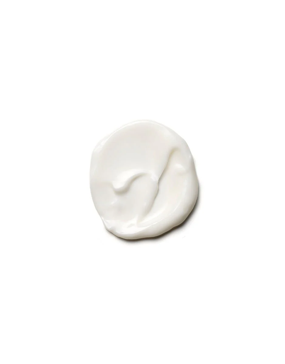 White cream or paste on a white background