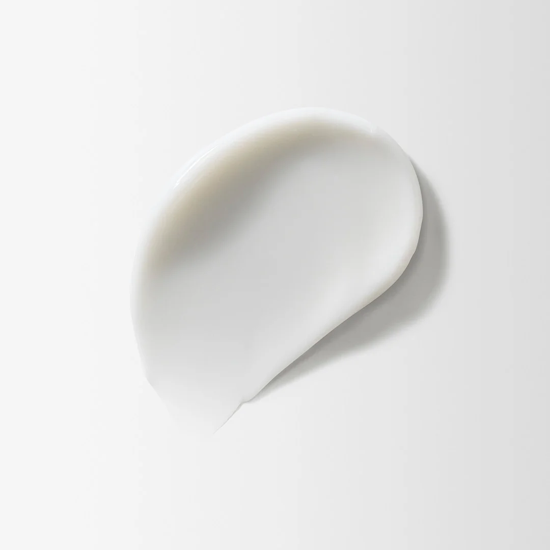 White ceramic spoon on a white background
