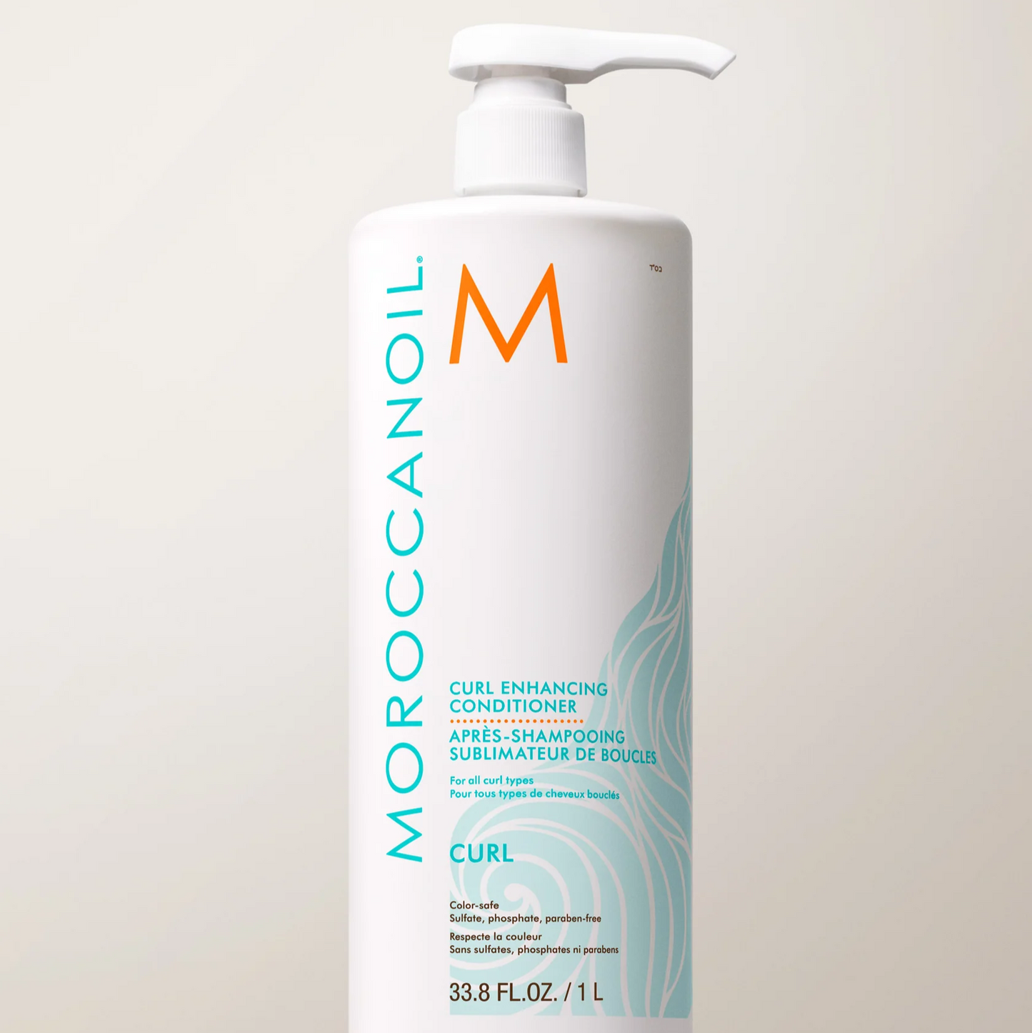 Moroccanoil Curl Enhancing Conditioner bottle on a light background