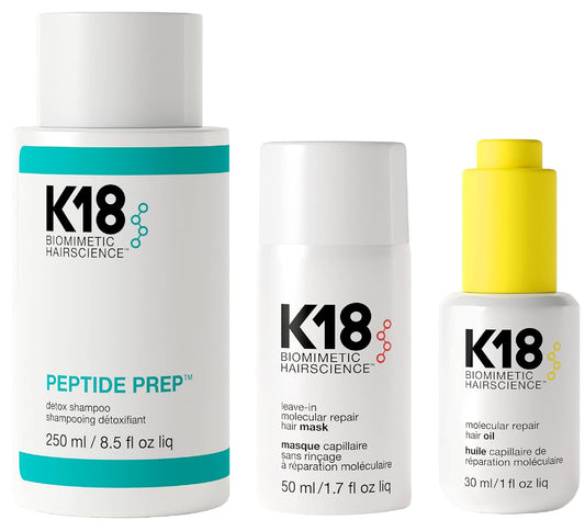 K18 hair care product set including Peptide Prep, Leave-in Molecular Repair Mask, and Molecular Repair Hair Oil on a white background.