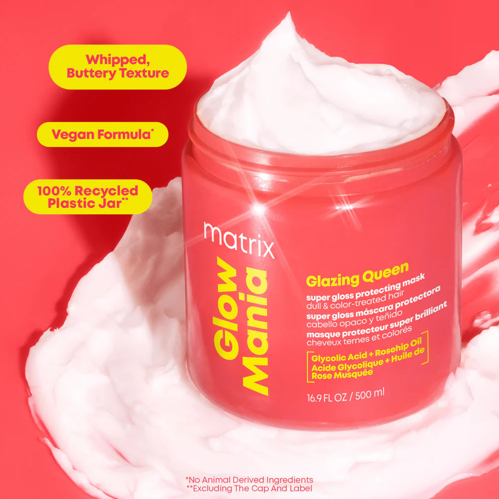 Pink jar of Matrix 'Glow Mania' product with whipped texture on a red background