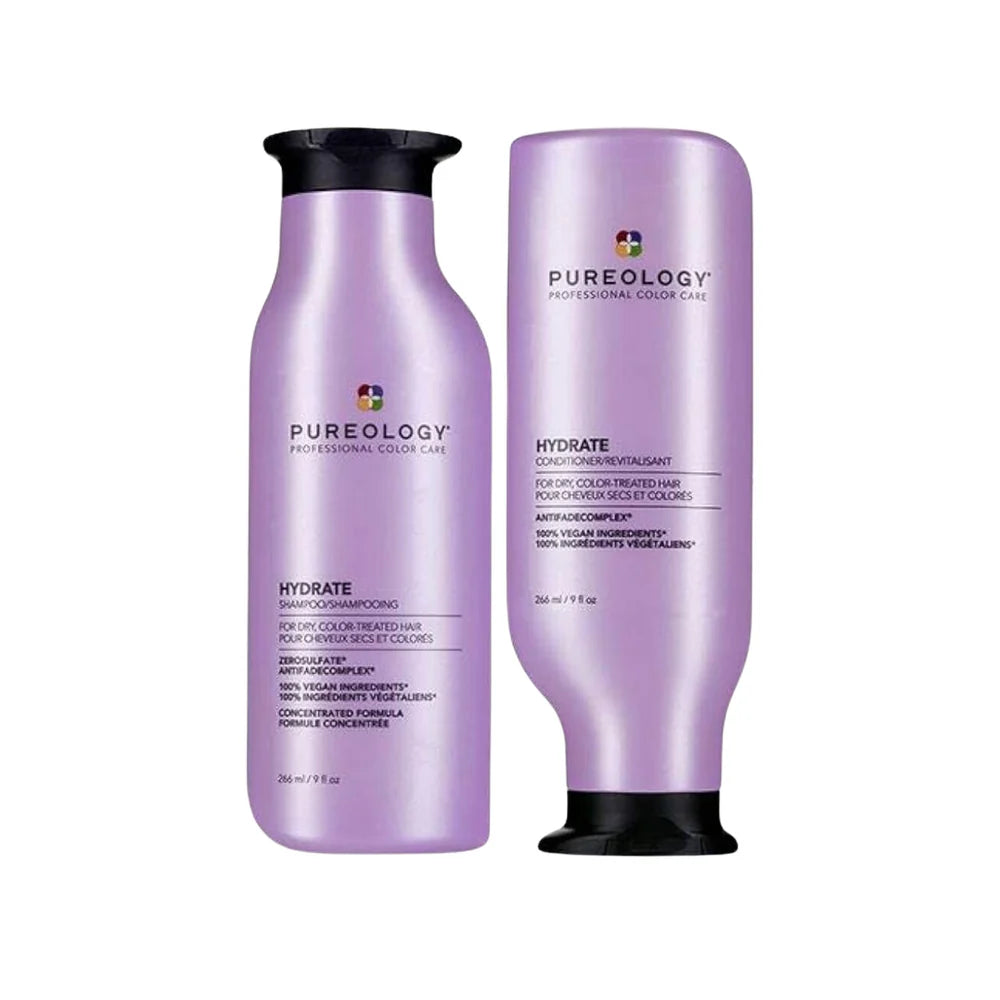 Two bottles of Pureology shampoo and conditioner on a white background