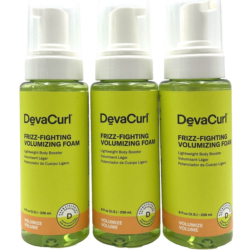 Three bottles of DevaCurl Frizz-Fighting Volumizing Foam on a white background