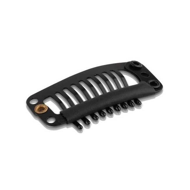 Black clip on extension metal comb on a white background