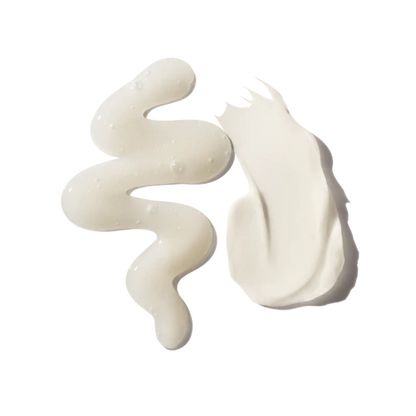 White cream swatches of olaplex shampoo and conditioner on a white background