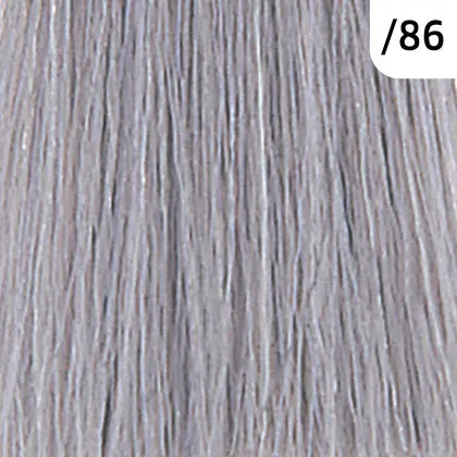 Close-up of gray hair strands with a color code label '86' in the corner.