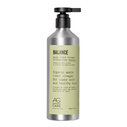 Shampoo bottle labeled 'Balance' with a pump on a white background