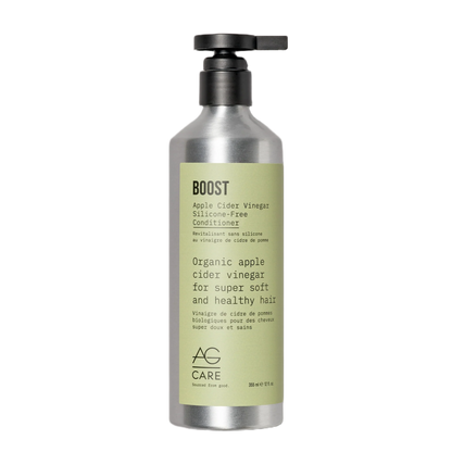 Bottle of AG Care Boost conditioner with a pump on a white background