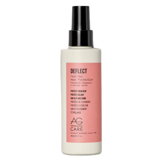 Hair care product bottle with pink label on a white background