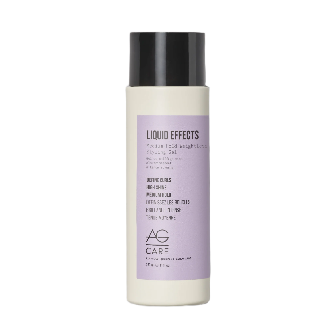 Hair product bottle with purple label on a white background