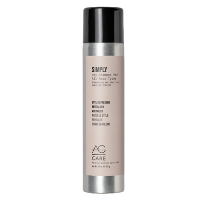 Hair care product bottle with beige label and black cap on a white background