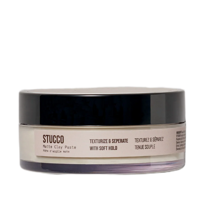 Jar of Stucco paint on a white background