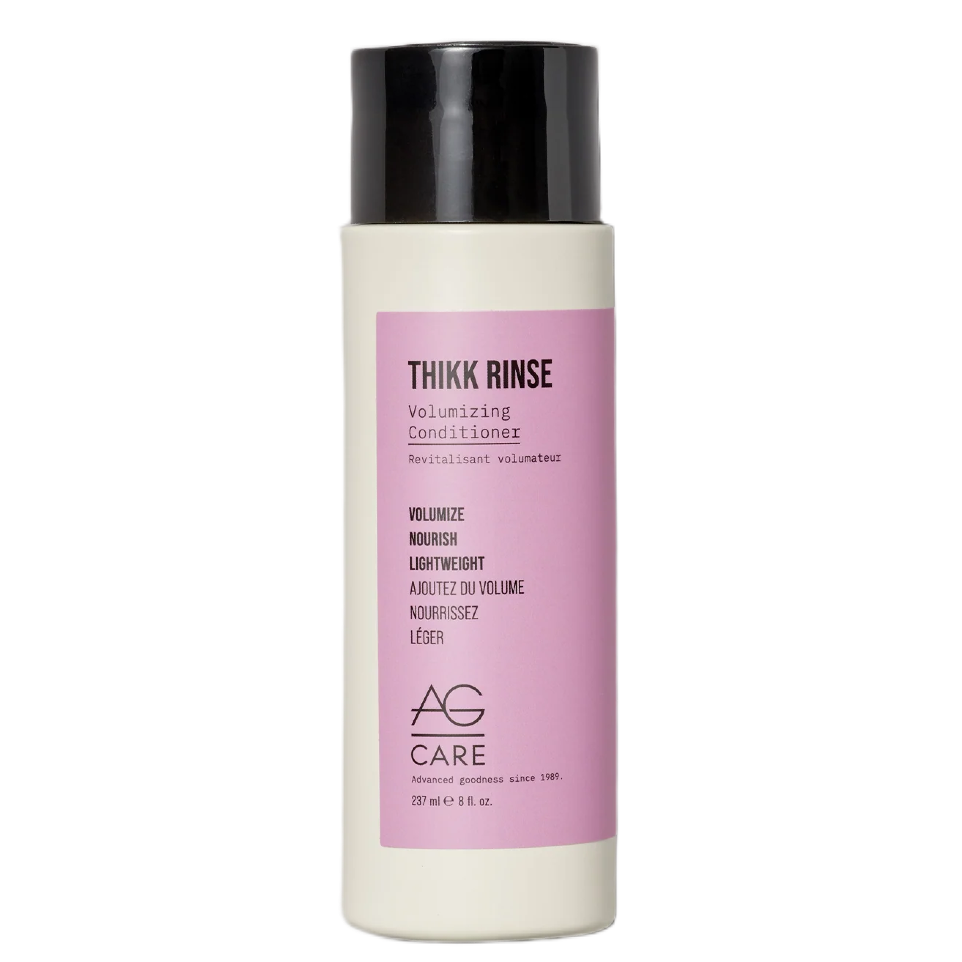 Bottle of AG Care Thikk Rinse on a white background