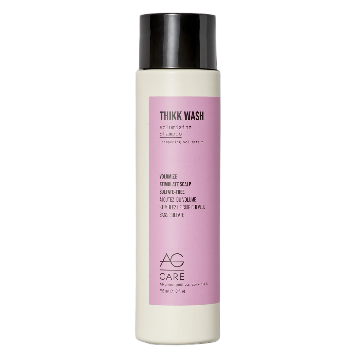 Shampoo bottle with pink label on a white background