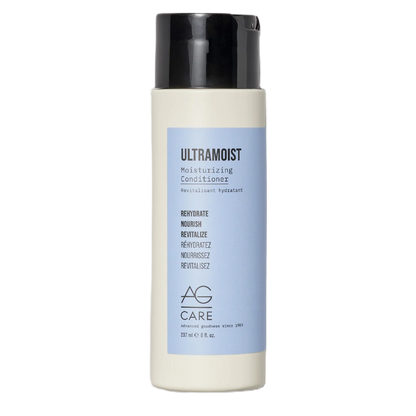 Shampoo bottle with black cap and blue label on a white background