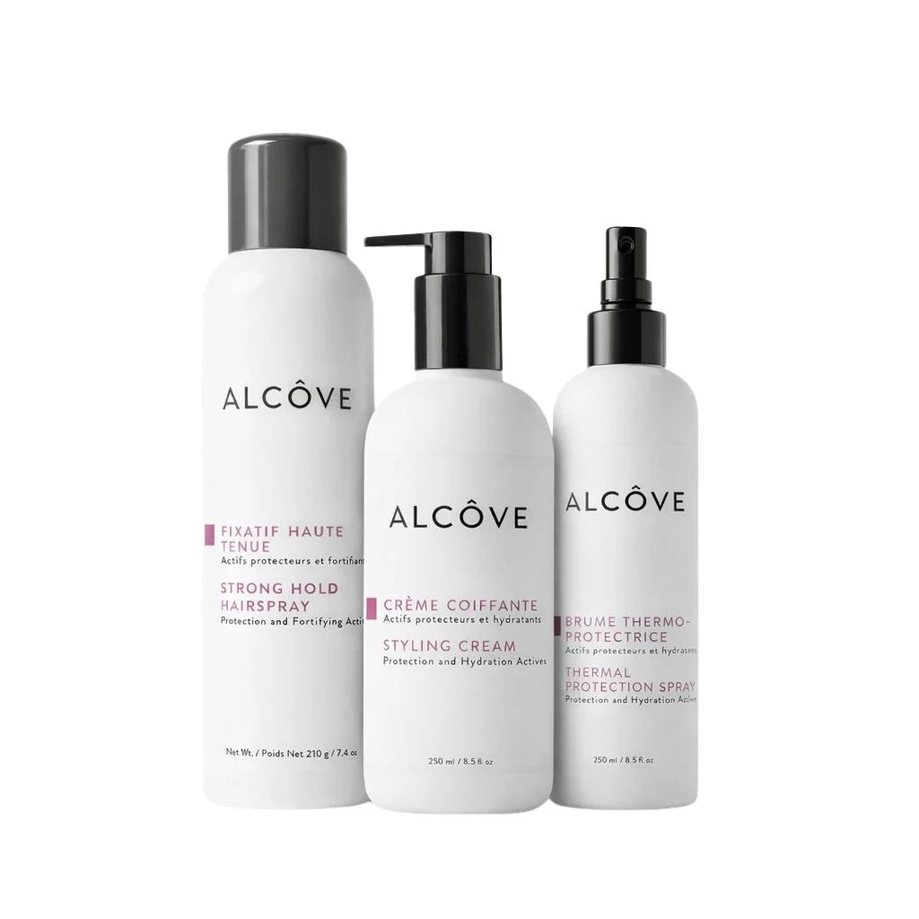 Three bottles of Alcçove hair care products on a white background